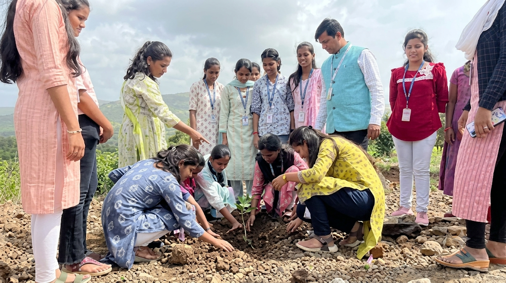 Students planting saplings